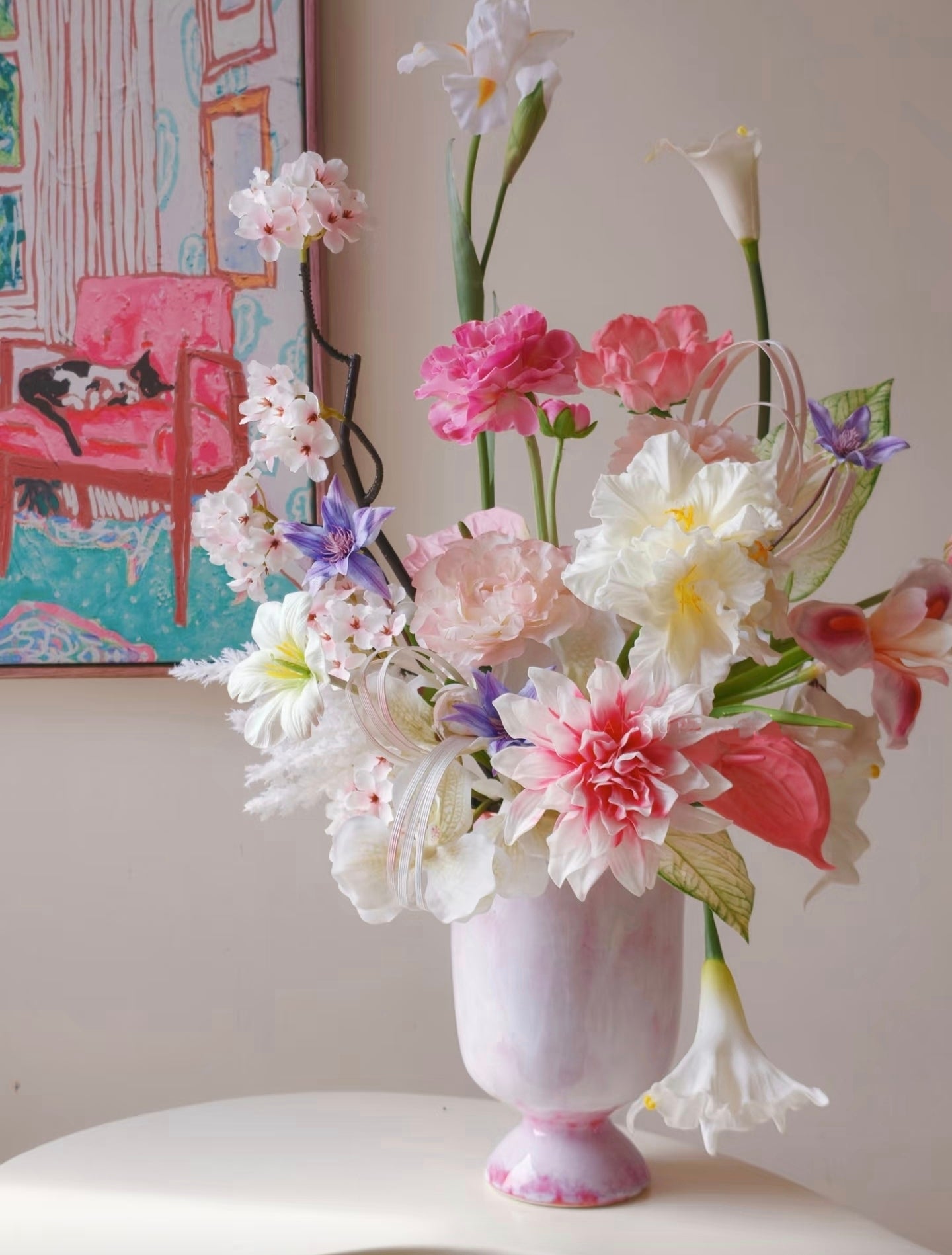 Blush garden faux flower bouquet in pink marble urn vase - front view