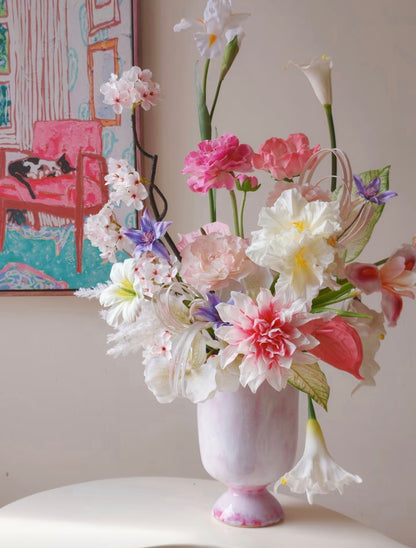 Blush garden faux flower bouquet in pink marble urn vase - front view