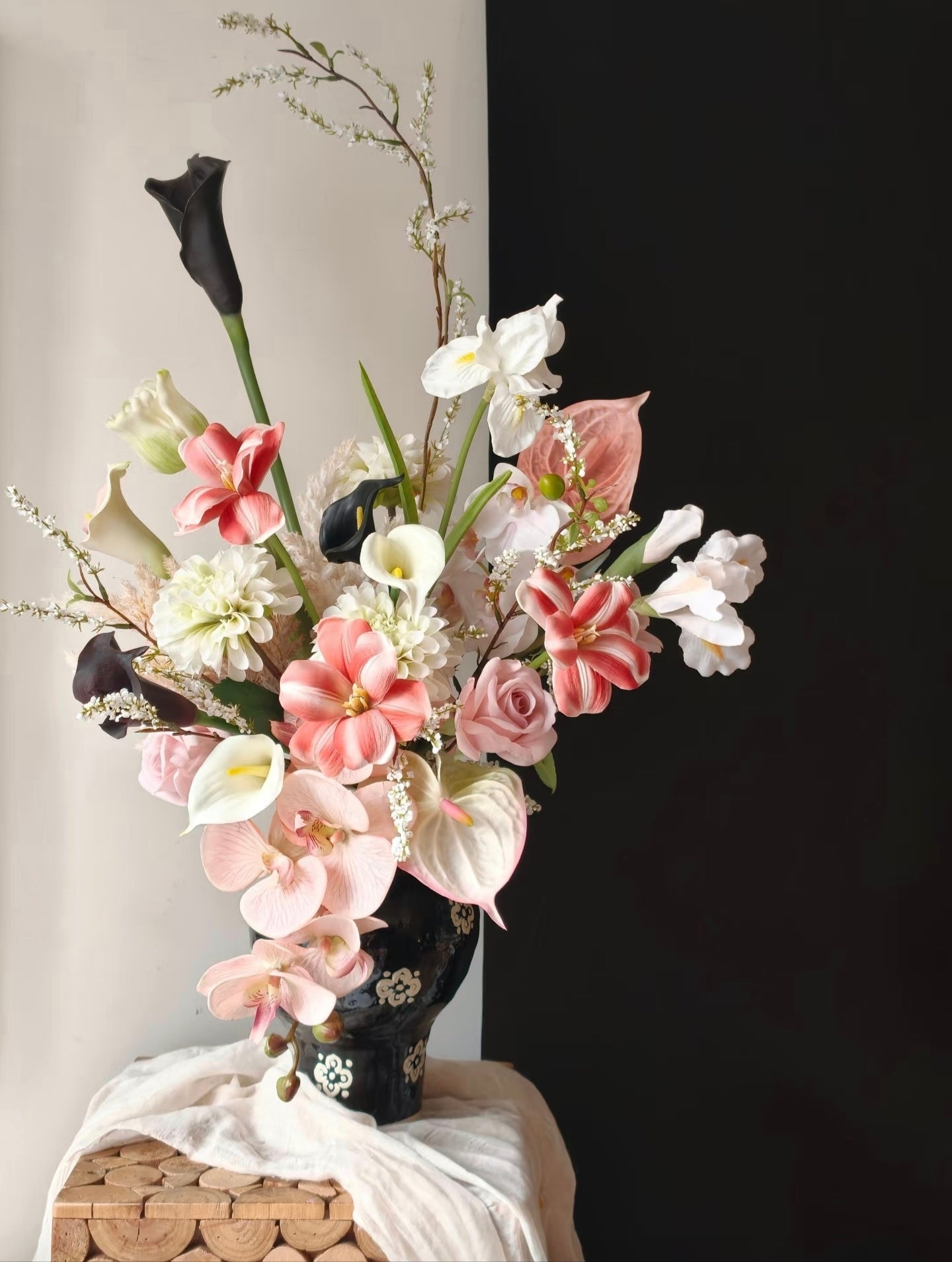 Ink & Petal bouquet against black and white split background