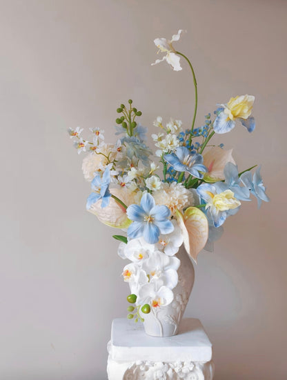 Cloud & Petal bouquet styled with colourful art print backdrop - close up