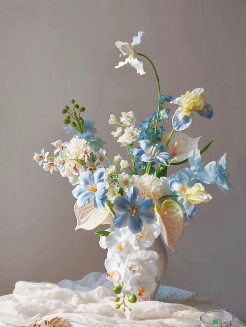 Cloud & Petal bouquet on wooden block - side angle showing full silhouette