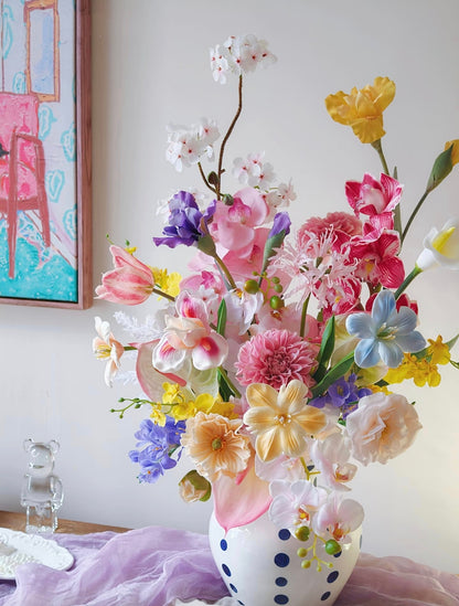 The Grand Garden bouquet on white pedestal - full silhouette, clean background