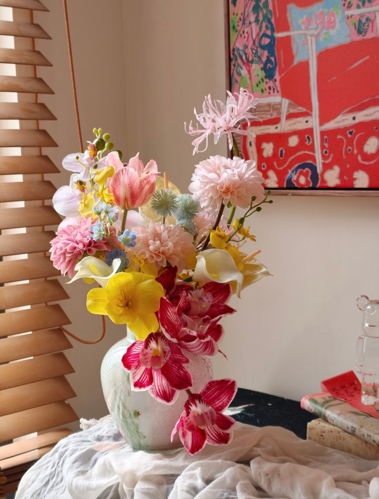 Wild & Wonderful bouquet - close up of crimson cymbidium orchids and yellow calla lilies